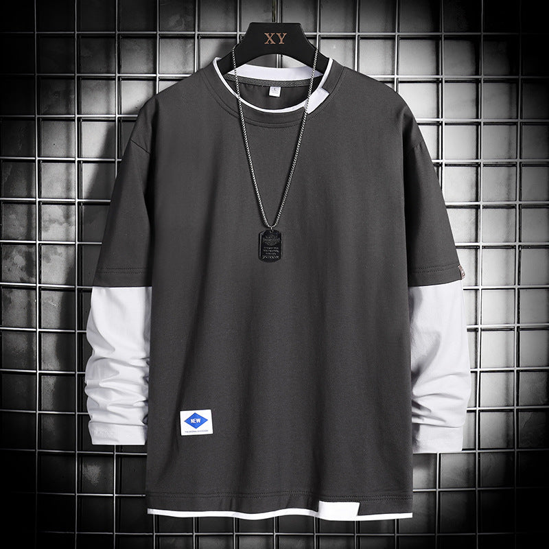 Black and white long sleeve layered t-shirt with dog tag necklace, modern streetwear style