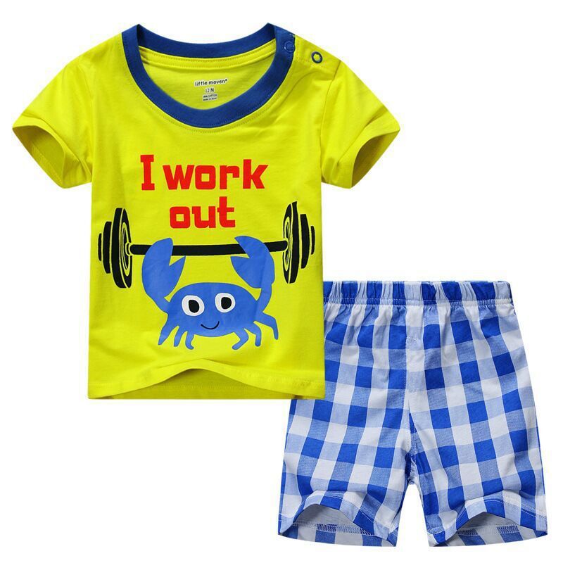 Children's boys' summer clothes suit by Ancient Energy, lightweight and casual outfit for kids, shown on a boy model.