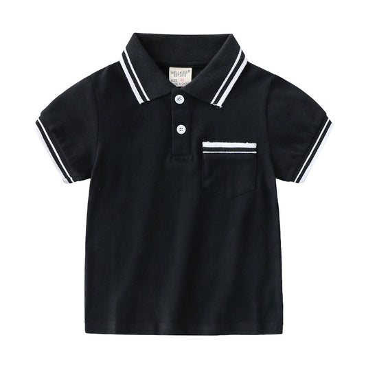 Young boy wearing a blue summer polo t-shirt by Ancient Energy, casual style perfect for warm weather.