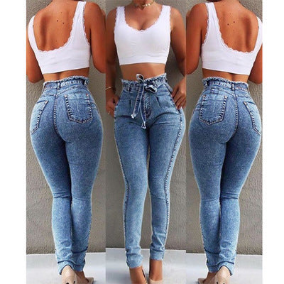 Ancient Energy fringed jeans featuring distressed denim with fringe details along the hem, casual and trendy style.