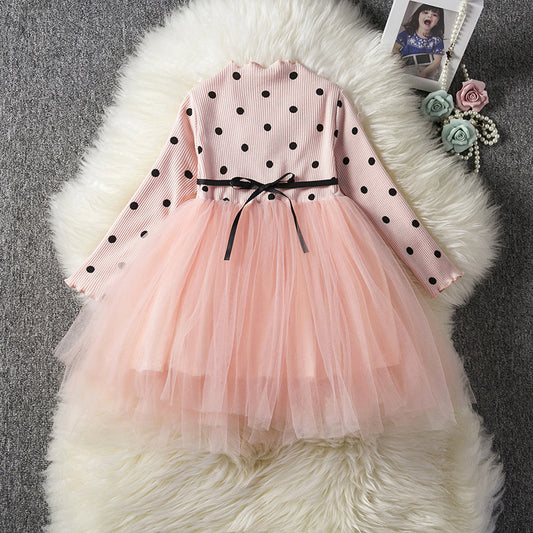 Baby girl in a long-sleeve lace tutu dress by Ancient Energy, perfect for spring, winter, birthday, or christening celebrations.