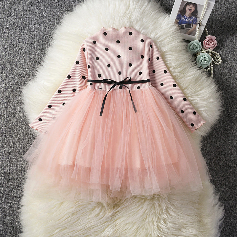 Baby girl in a long sleeve lace tutu dress by Ancient Energy, perfect for spring, winter, or birthday celebrations.