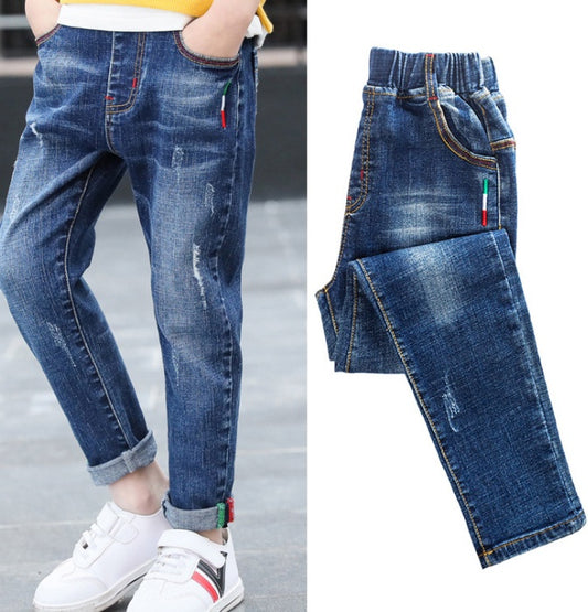 Boys' denim trousers by Ancient Energy, new style big children's pants for spring and autumn, shown on a child.