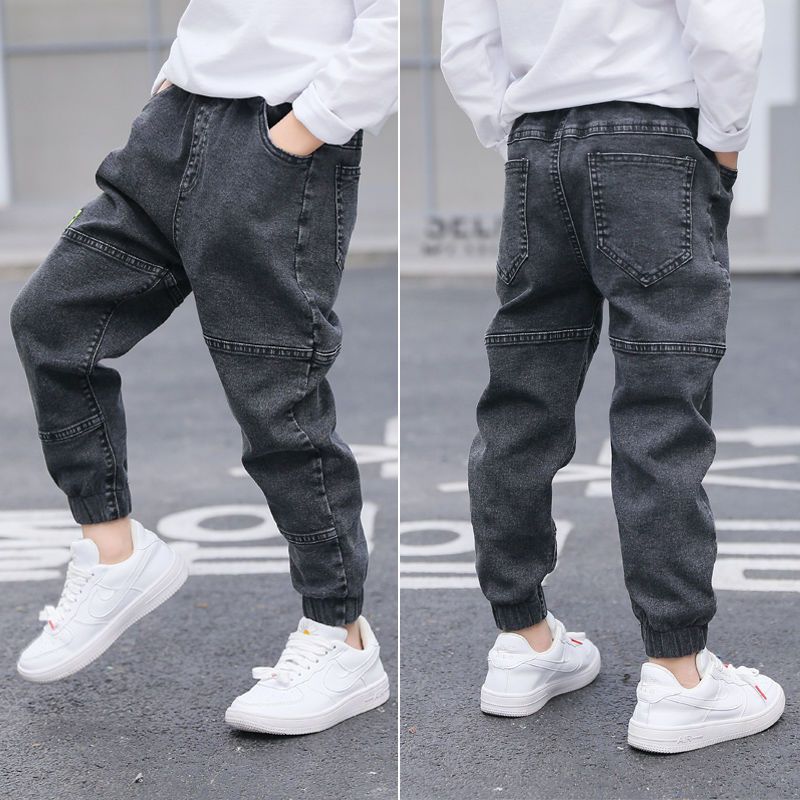Ancient Energy boys' spring and autumn jeans, casual denim pants for kids, shown in a natural pose.
