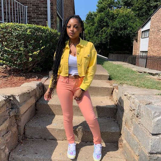 Women’s denim streetwear jacket by Ancient Energy, casual cropped outwear with a fitted bodycon style and classic blue denim look.