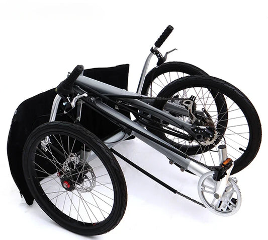 Lying on a tricycle, 3 shifting disc brakes, folding on a recumbent bike, casual commuting, riding a recumbent bicycle