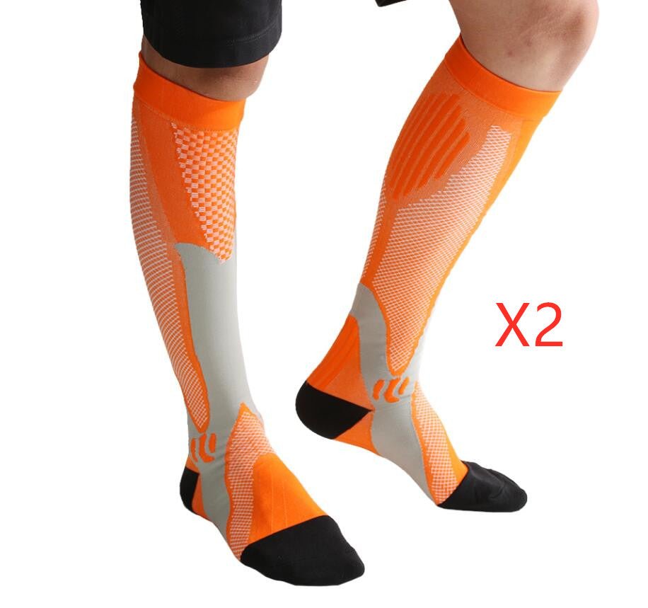 Ancient Energy athletic compression socks for men and women, designed to boost stamina and improve circulation during sports.