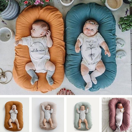 Ancient Energy Baby Nest Bed Crib for newborns, portable cotton infant crib, travel cradle and cushion for cozy newborn comfort.