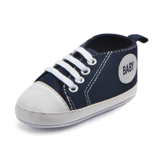 Ancient Energy canvas sports sneakers for babies and toddlers, soft sole, anti-slip infant shoes for boys and girls.