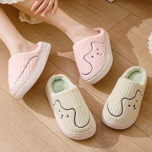 Pair of Cozy Striped Cat Slippers for Couples by Ancient Energy, plush warm indoor house shoes with non-slip soles.