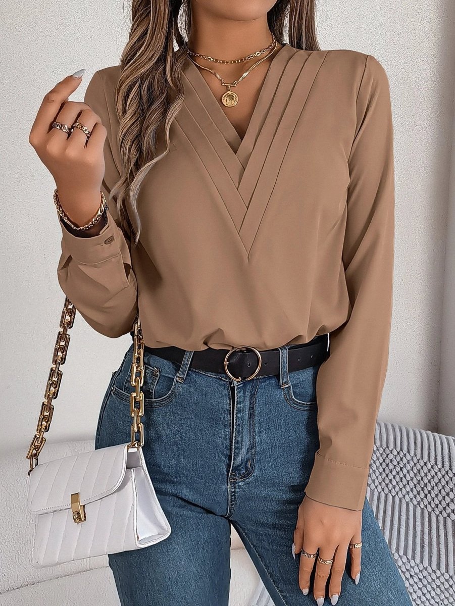 Ancient Energy women's V-neck long sleeve blouse, solid design, suitable for office and professional wear.