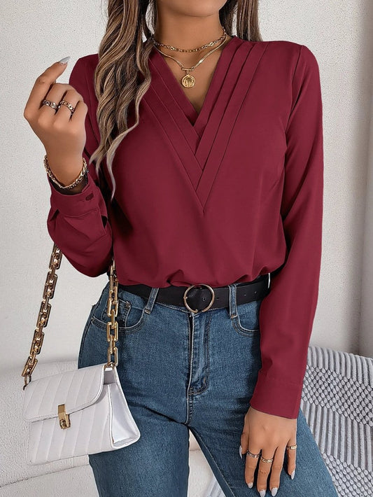 Ancient Energy women's V-neck long sleeve blouse in solid fabric, suitable for office and casual wear, elegant commuter style.