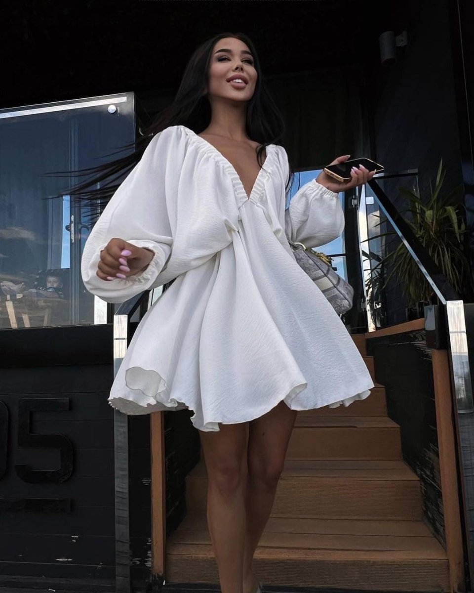 Elegant V-neck lantern sleeve dress for women by Ancient Energy, showcased in a stylish and fashionable design.