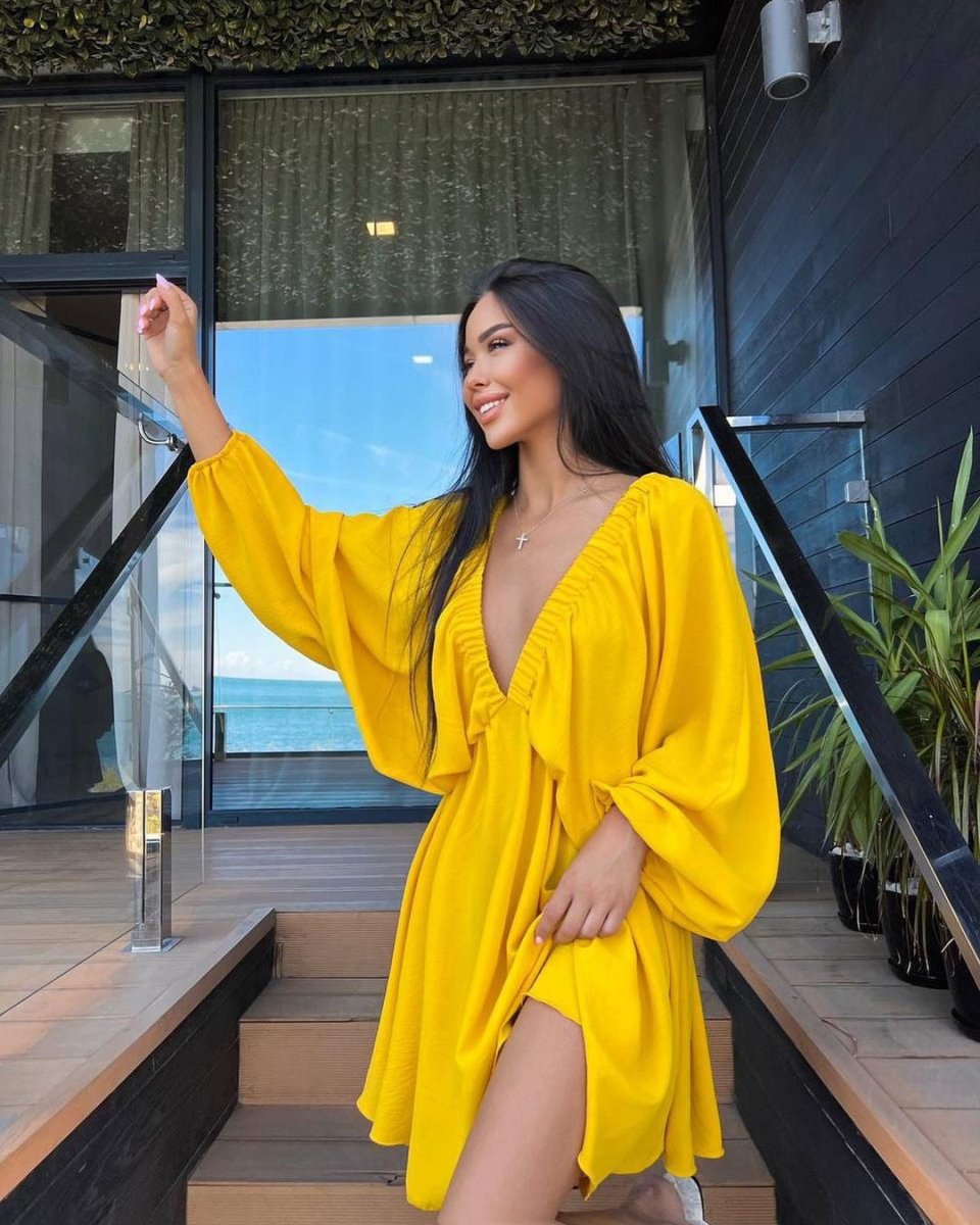 Elegant V-neck lantern sleeve dress for women by Ancient Energy, featuring a stylish and flowing design.