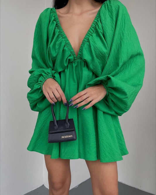 Elegant women's V-neck lantern sleeve dress by Ancient Energy, featuring a stylish and fashionable design.