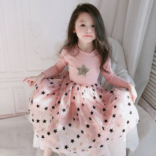 Girls' dress by Ancient Energy, featuring a stylish design with colorful patterns and comfortable fabric for everyday wear.