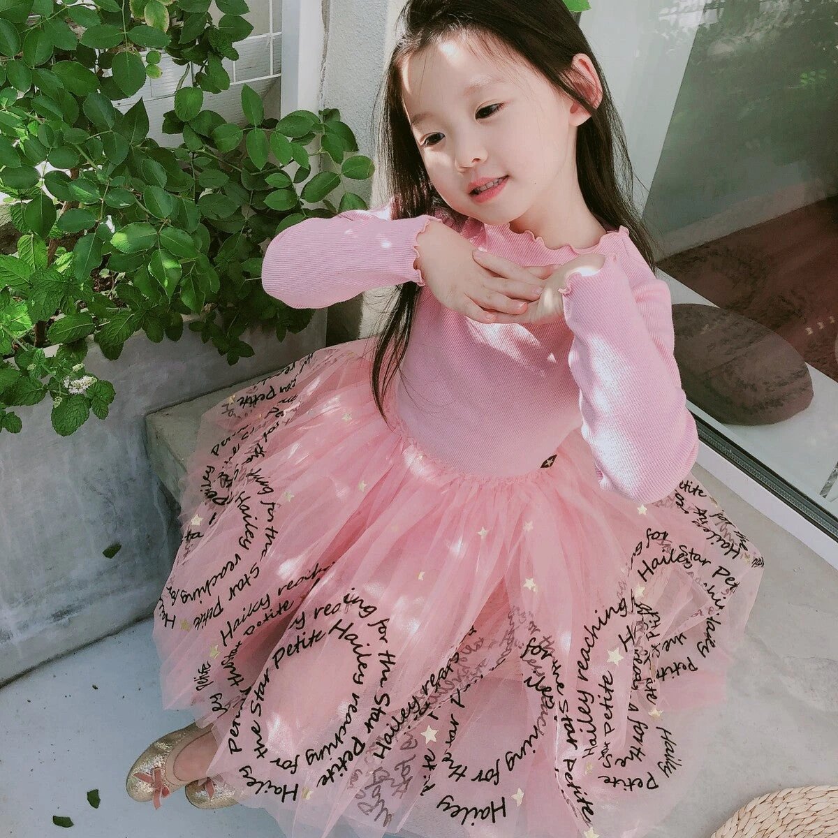 Girls' dress from Ancient Energy, featuring a colorful, patterned design perfect for casual wear and playtime.
