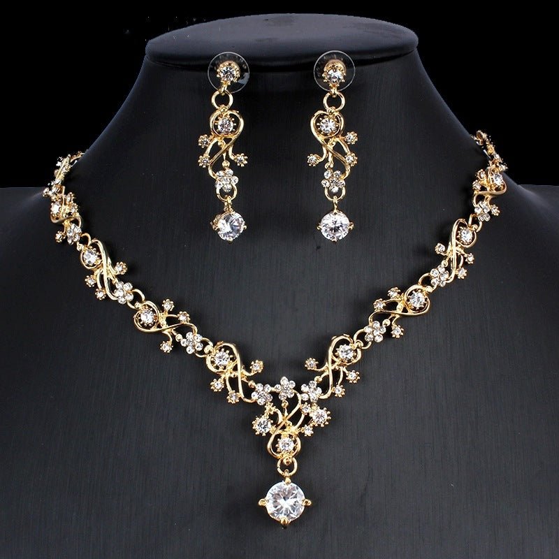 Golden zircon bridal jewelry set featuring a necklace and matching earrings by Ancient Energy for wedding occasions.