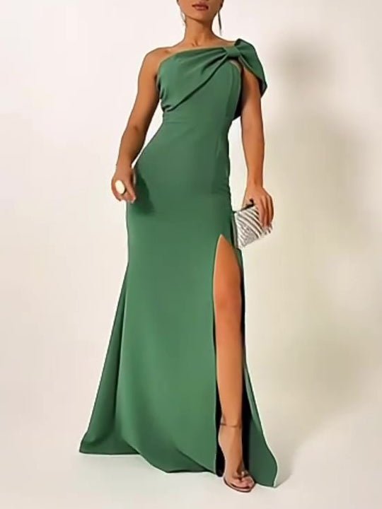 Green bow-tie tube top evening dress by Ancient Energy, featuring a fitted silhouette and stylish design.