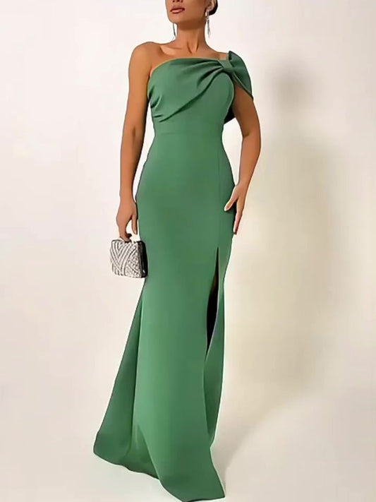 Green bow-tie tube top evening dress by Ancient Energy featuring a fitted silhouette and elegant style for formal occasions.
