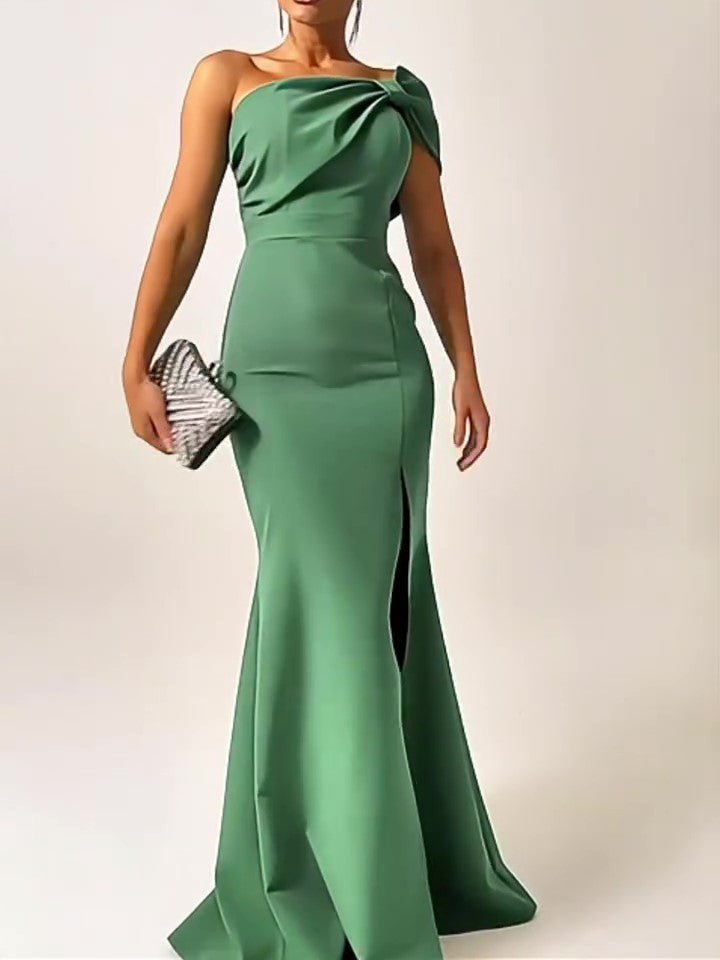 Green bow-tie tube top evening dress by Ancient Energy, featuring a fitted style and elegant design for formal occasions.