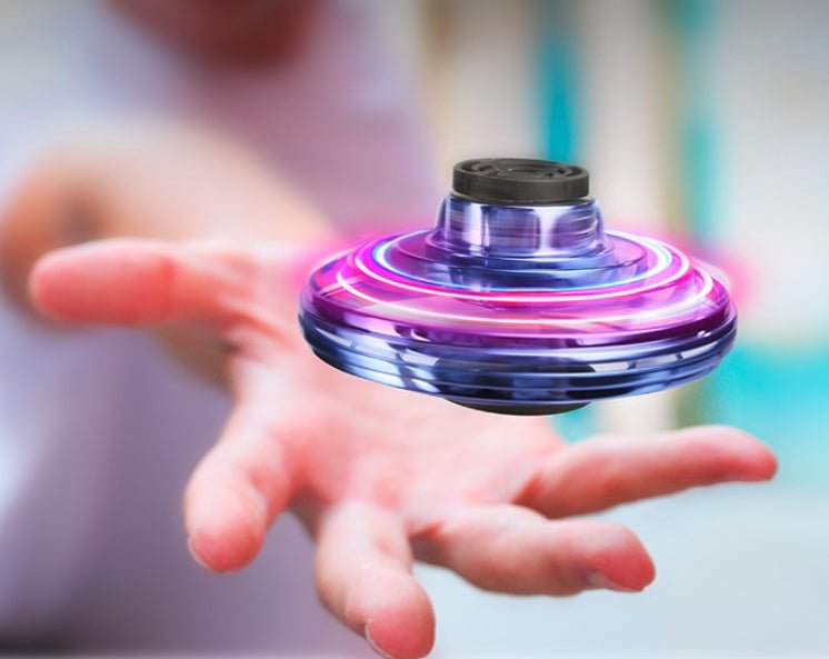 Ancient Energy LED UFO flying helicopter spinner toy for kids, with colorful lights and spinning propeller design.