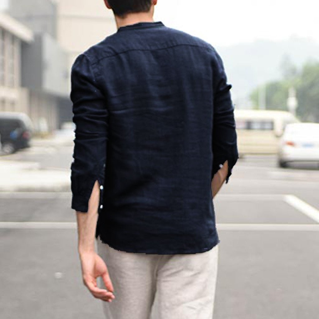 Men's vintage white linen shirt with button closure from Ancient Energy, featuring a classic, casual style and lightweight fabric.