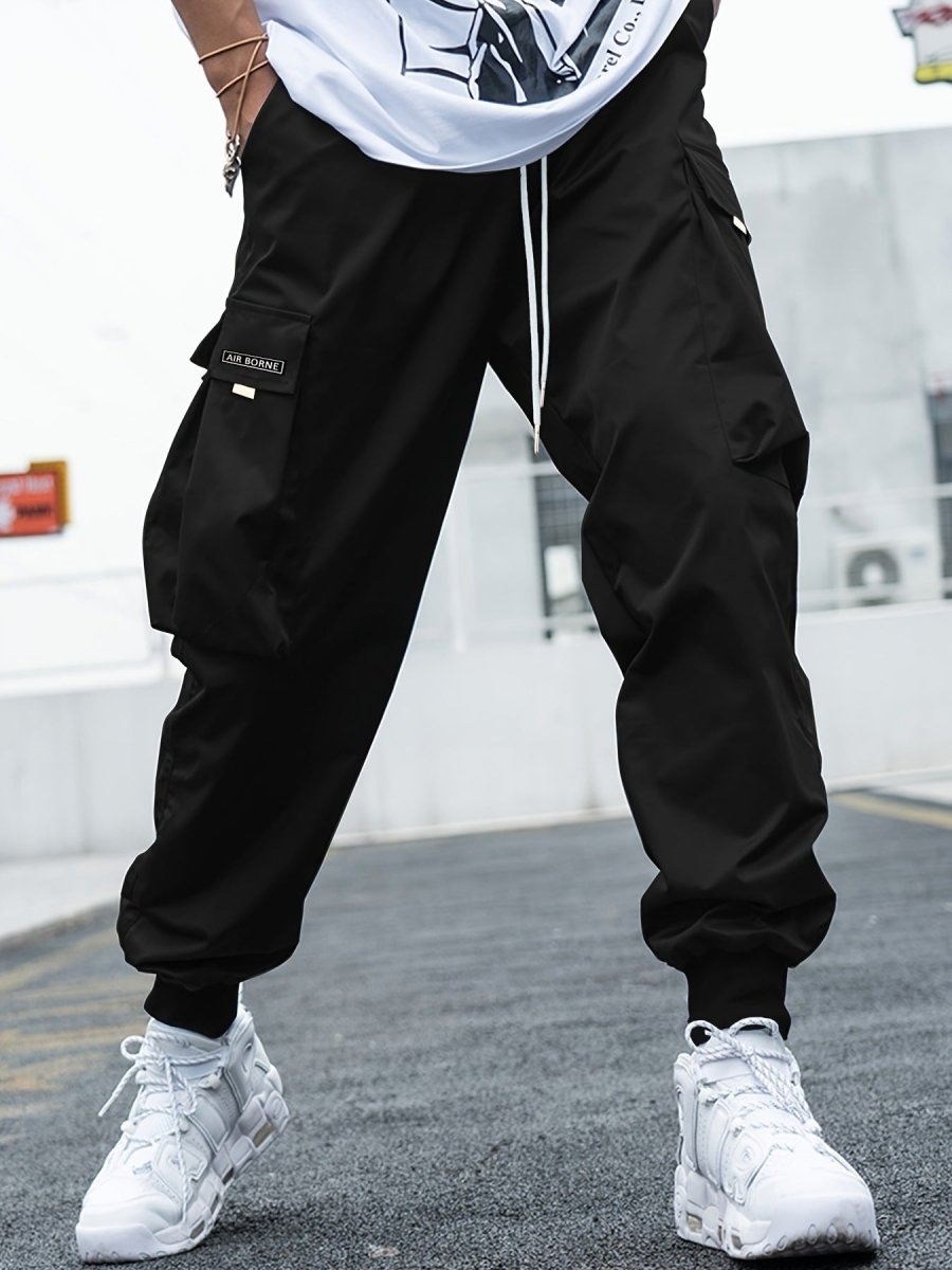 Ancient Energy men's multi-pocket cargo pants with drawstring waist, casual hip-hop style, ideal for outdoor streetwear and sports.