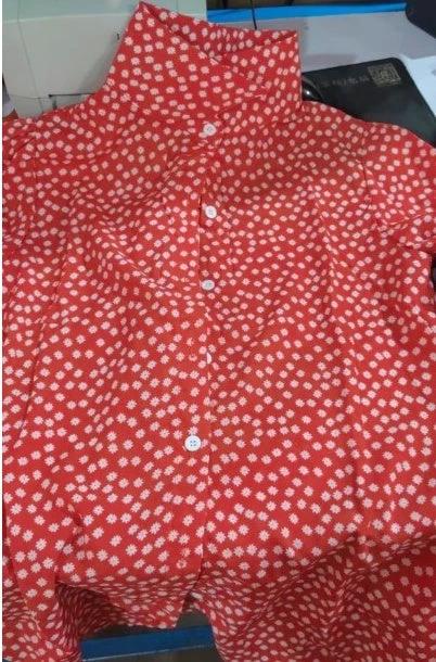 Printed long sleeve V-neck button blouse for women by Ancient Energy, featuring a stylish design and comfortable fit.