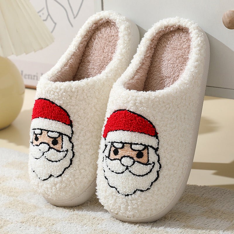 Pair of warm Santa Claus cartoon cotton slippers from Ancient Energy, featuring furry winter shoes for couples.