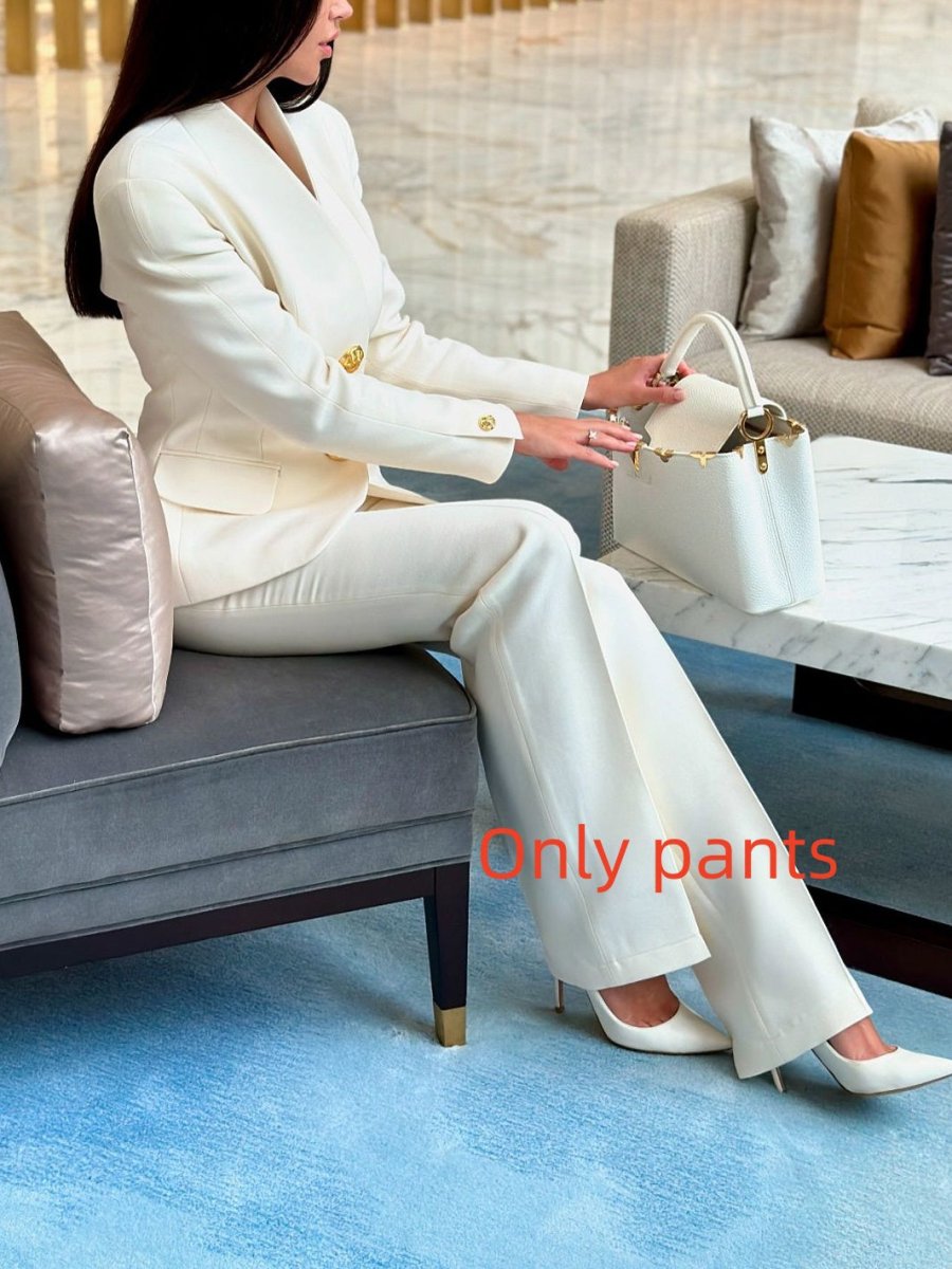 Ancient Energy solid color single-breasted blazer and high-waisted pants set, displayed on a mannequin, front view.