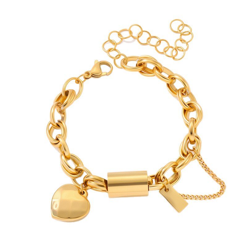 Titanium bracelet by Ancient Energy featuring a heart-shaped pendant, showcasing a sleek and versatile jewelry design.