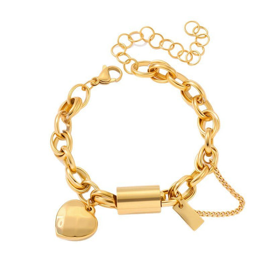 Titanium bracelet by Ancient Energy featuring a heart-shaped pendant, showcasing a sleek and versatile jewelry design.