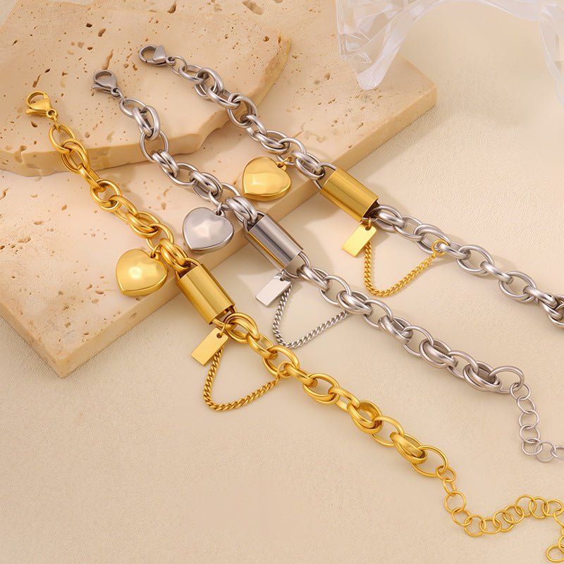 Ancient Energy titanium bracelet featuring a heart-shaped pendant, showcasing a sleek and versatile design for stylish wear.
