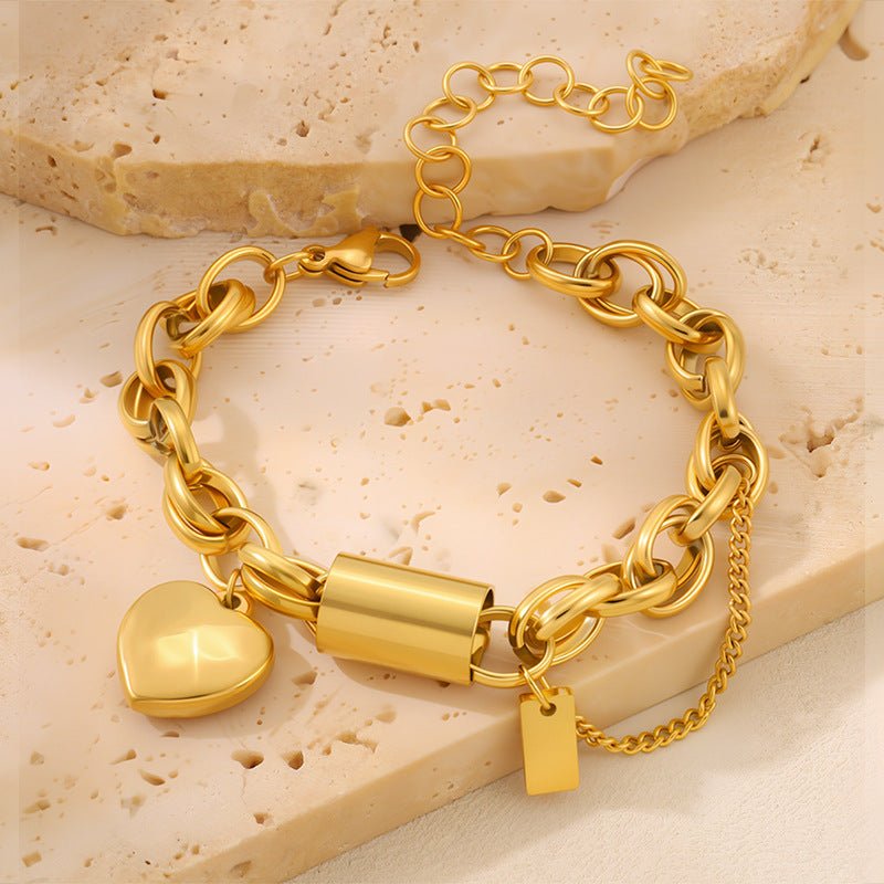 Titanium bracelet with a heart-shaped pendant from Ancient Energy, featuring a sleek, versatile design suitable for daily wear.