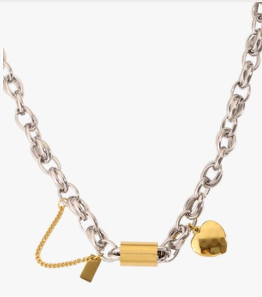 Ancient Energy titanium bracelet featuring a heart-shaped pendant, stylish and versatile jewelry accessory for everyday wear.