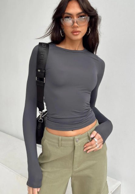 Women's slim long-sleeved pullover top by Ancient Energy, solid casual fit shirt ideal for stylish everyday wear.