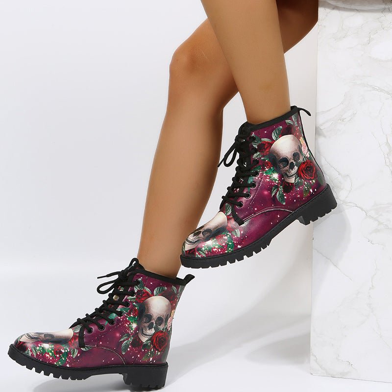 Ancient Energy women's high top workwear boots with large Halloween cartoon print and colorful pattern.