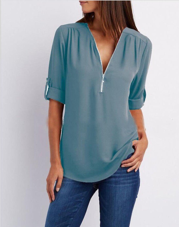 Ancient Energy women's short sleeve Zip V-neck shirt with a loose fit, casual style, and lightweight fabric.