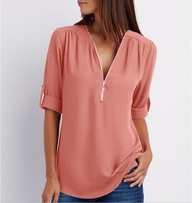 Ancient Energy women's short sleeve zip V-neck shirt with a loose fit, casual and comfortable for everyday wear.