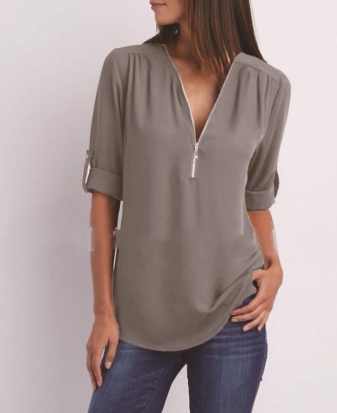 Ancient Energy women's short sleeve zip V-neck shirt, loose fit top with a relaxed style, ideal for casual wear.