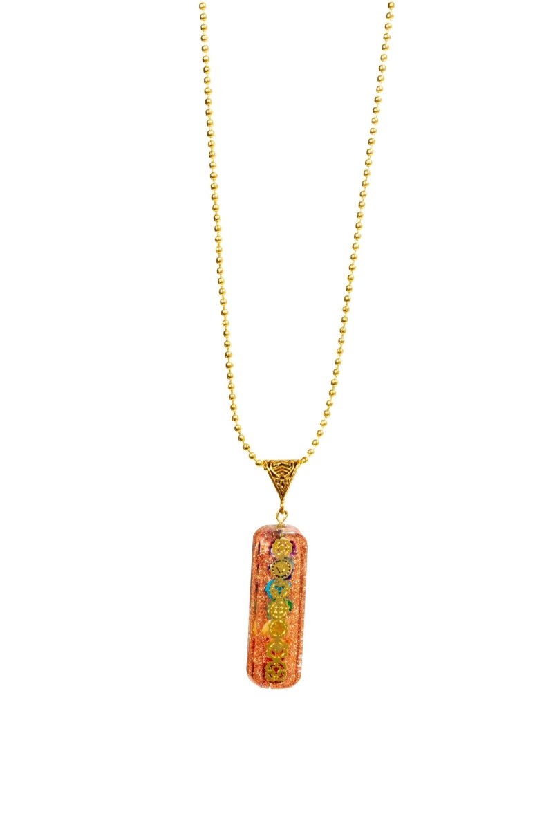 Seven chakra orgone copper pendant with chain, featuring colorful chakra symbols and a polished finish, designed for energy balancing.