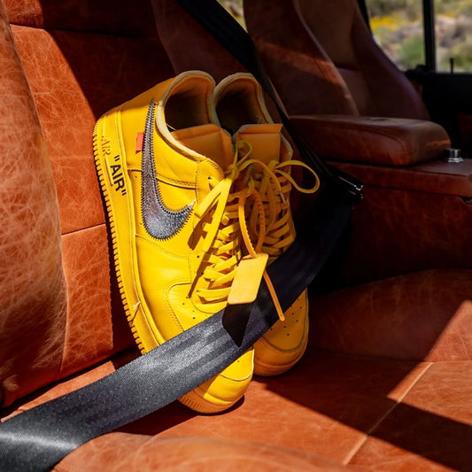 Yellow elastic shoelace from Bread’s Corona Yellow collection, shown with the product in a close-up view.