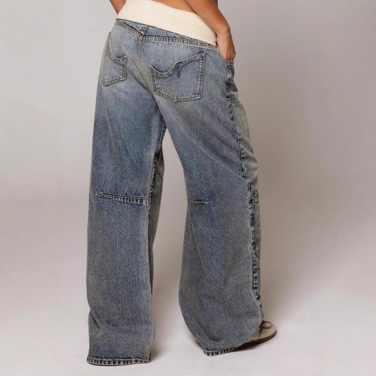 Loose-fitting straight-leg jeans with pockets from Ancient Energy, casual street-style trousers for women, relaxed fit denim pants.