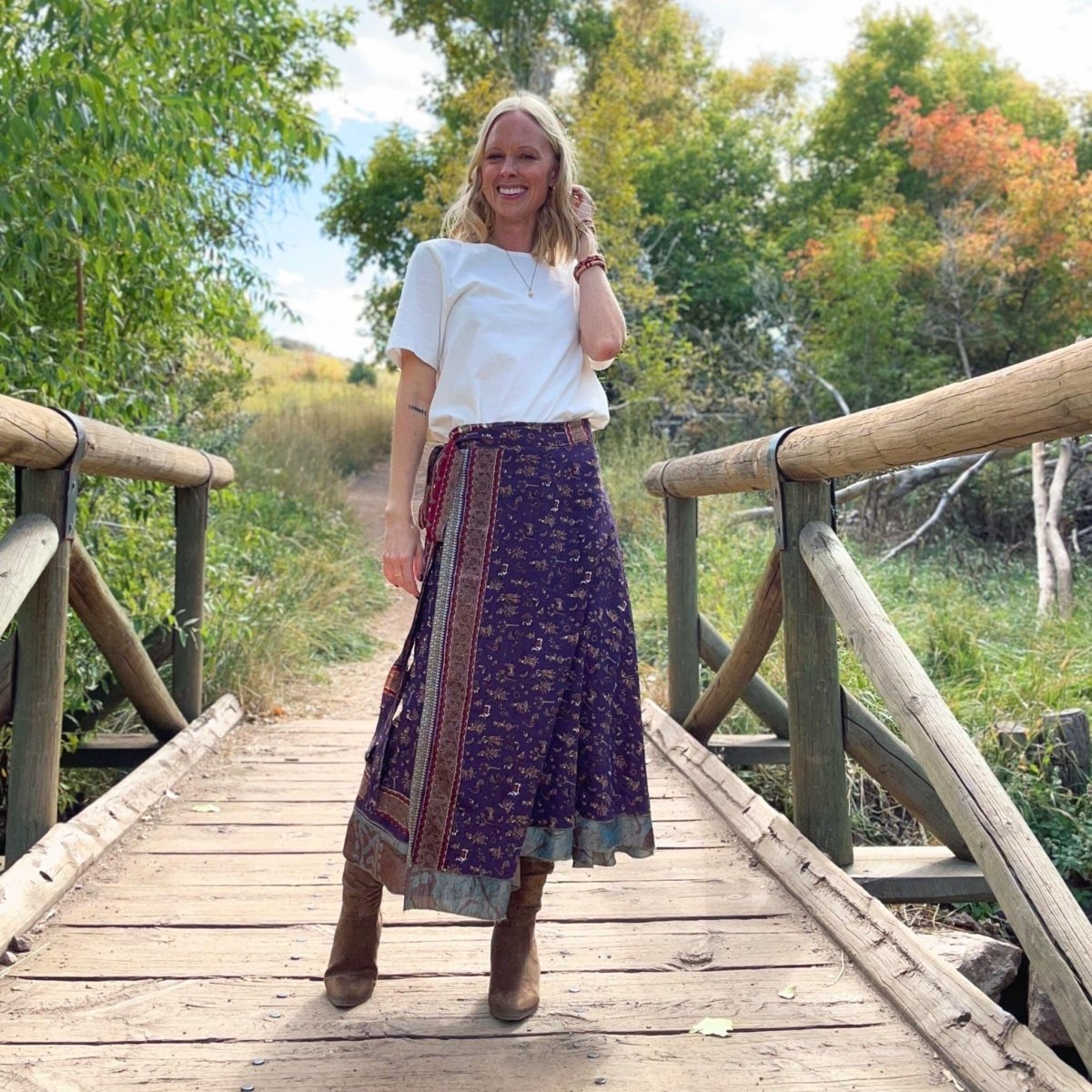 Colorful sari wrap skirt by Darn Good Yarn, featuring vibrant fabric and traditional wrap design for boho-style clothing.
