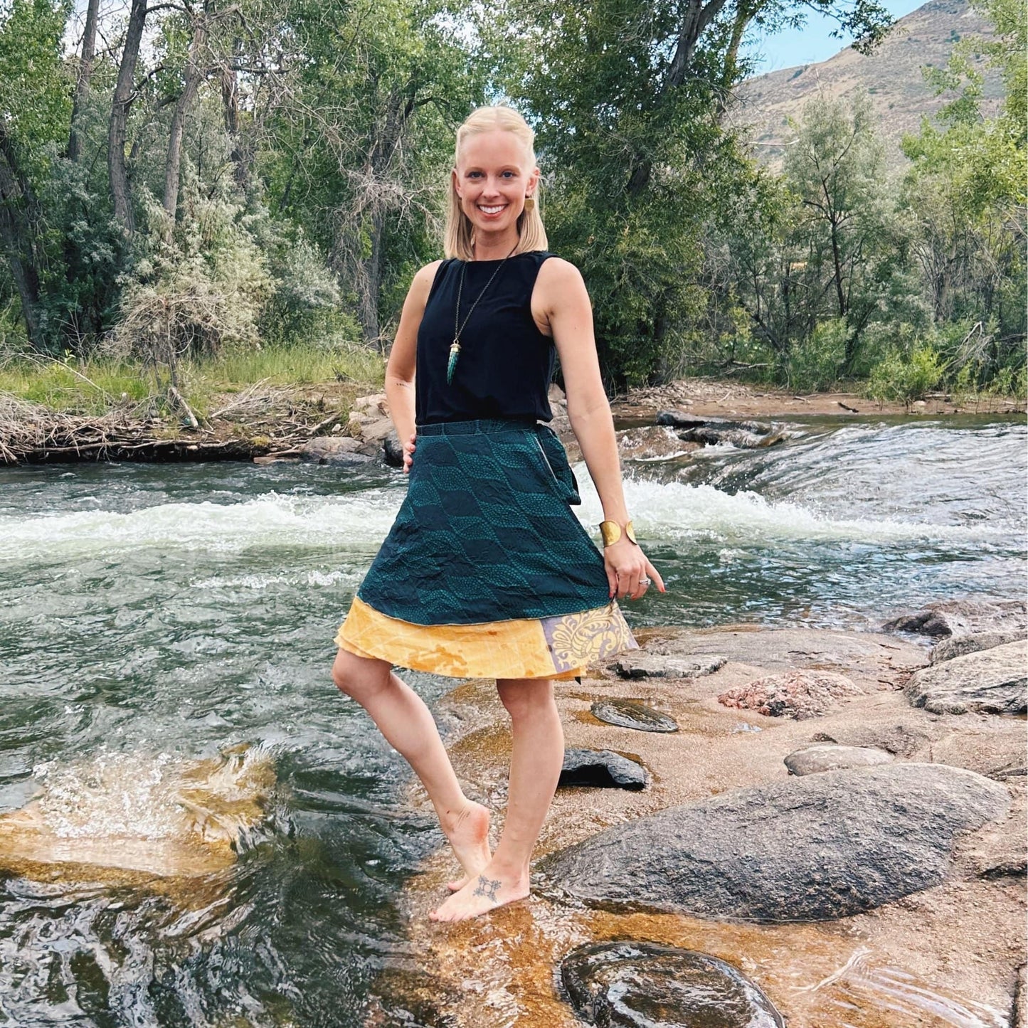 Darn Good Yarn Original Sari Wrap Skirt in vibrant fabric, showcasing its colorful, flowing design and traditional wrap style.