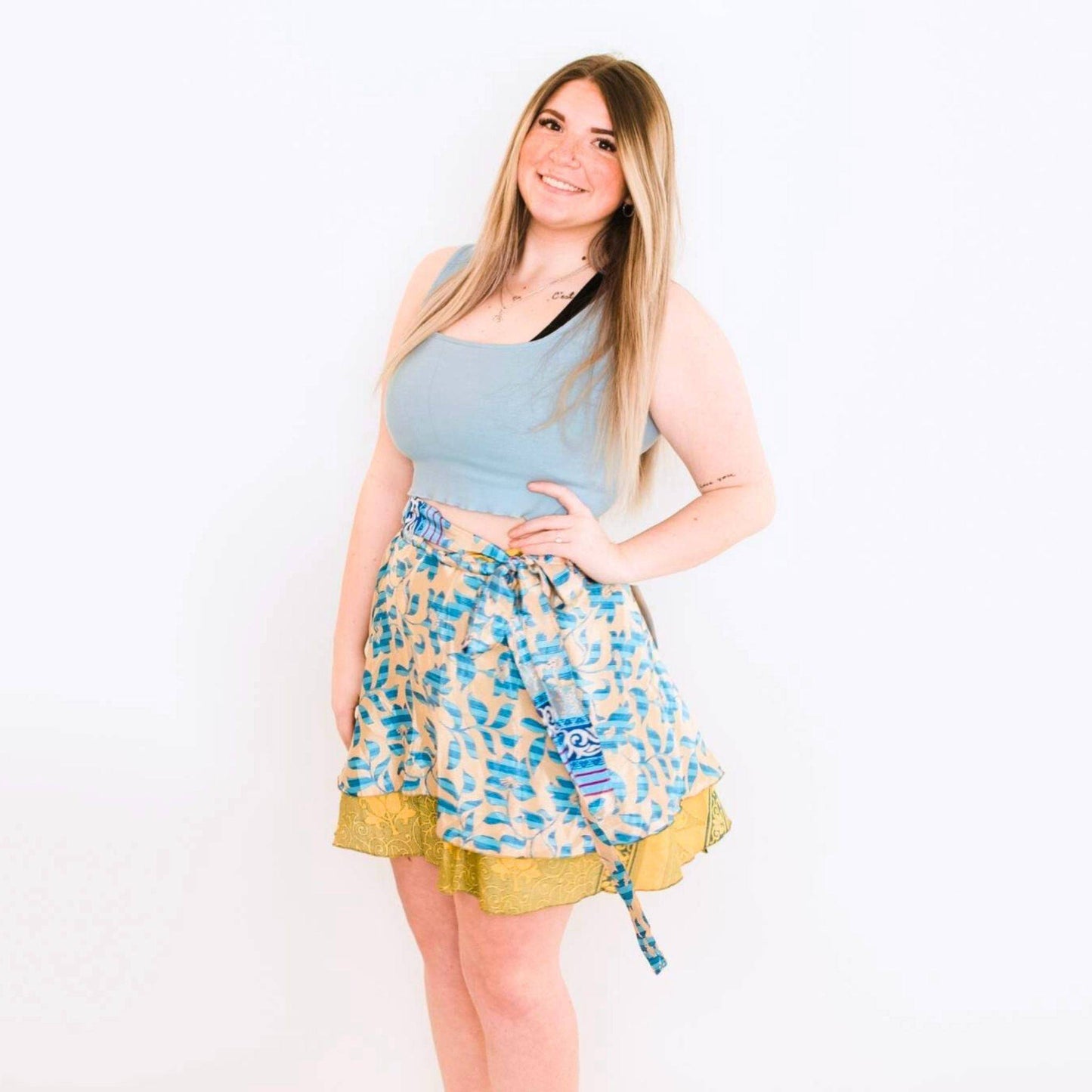 Colorful sari wrap skirt from Darn Good Yarn featuring vibrant fabric and a flowing, bohemian style.