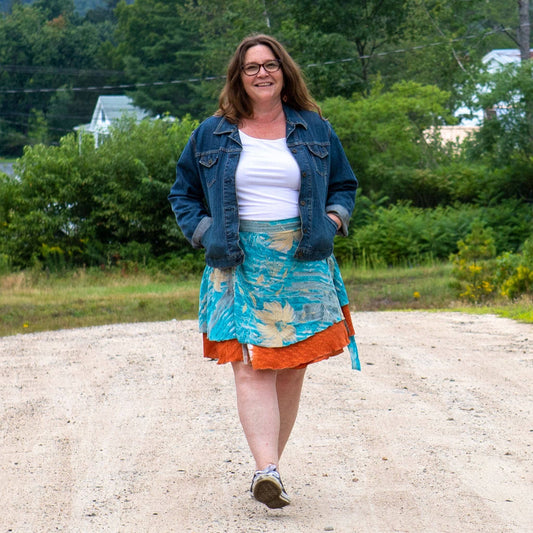 Colorful sari wrap skirt by Darn Good Yarn featuring vibrant patterns and flowing fabric, perfect for bohemian-style clothing.