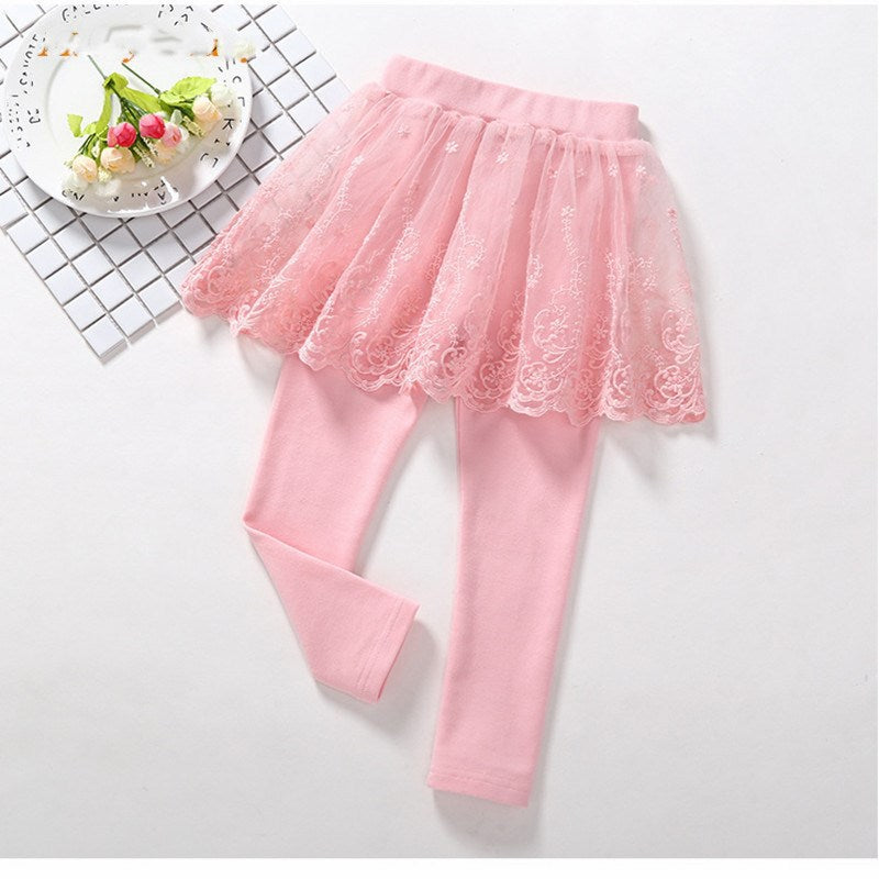 Children's cotton leggings with lace skirt overlay, featuring playful design by Ancient Energy, perfect for young girls.