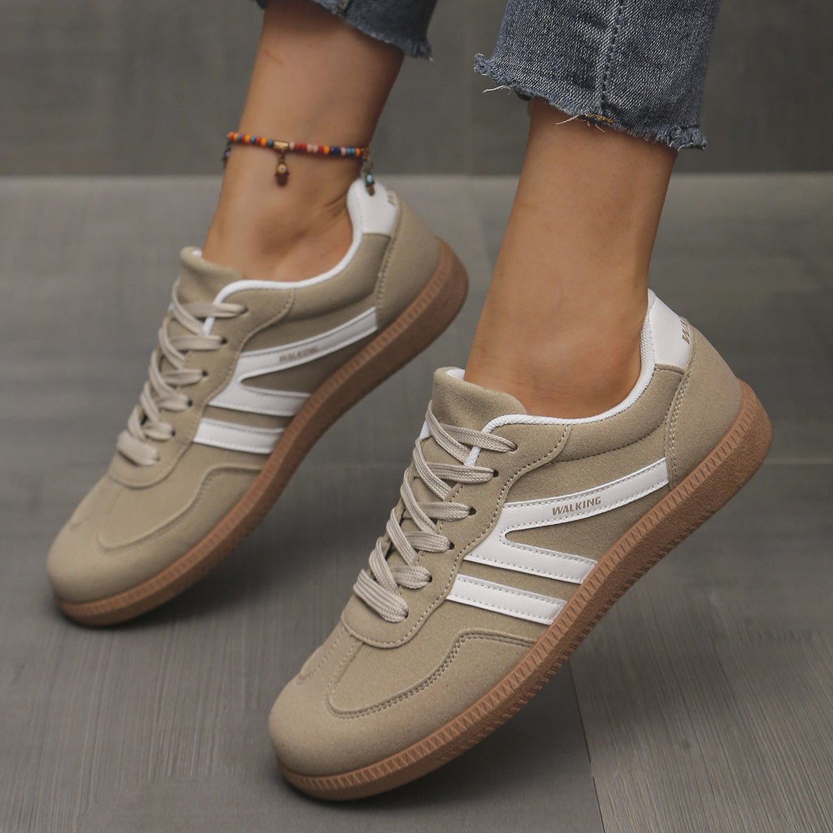 Women's lace-up low-top sneakers by FitiqueFit in 11 colors, featuring a sleek design and comfortable training shoe style.